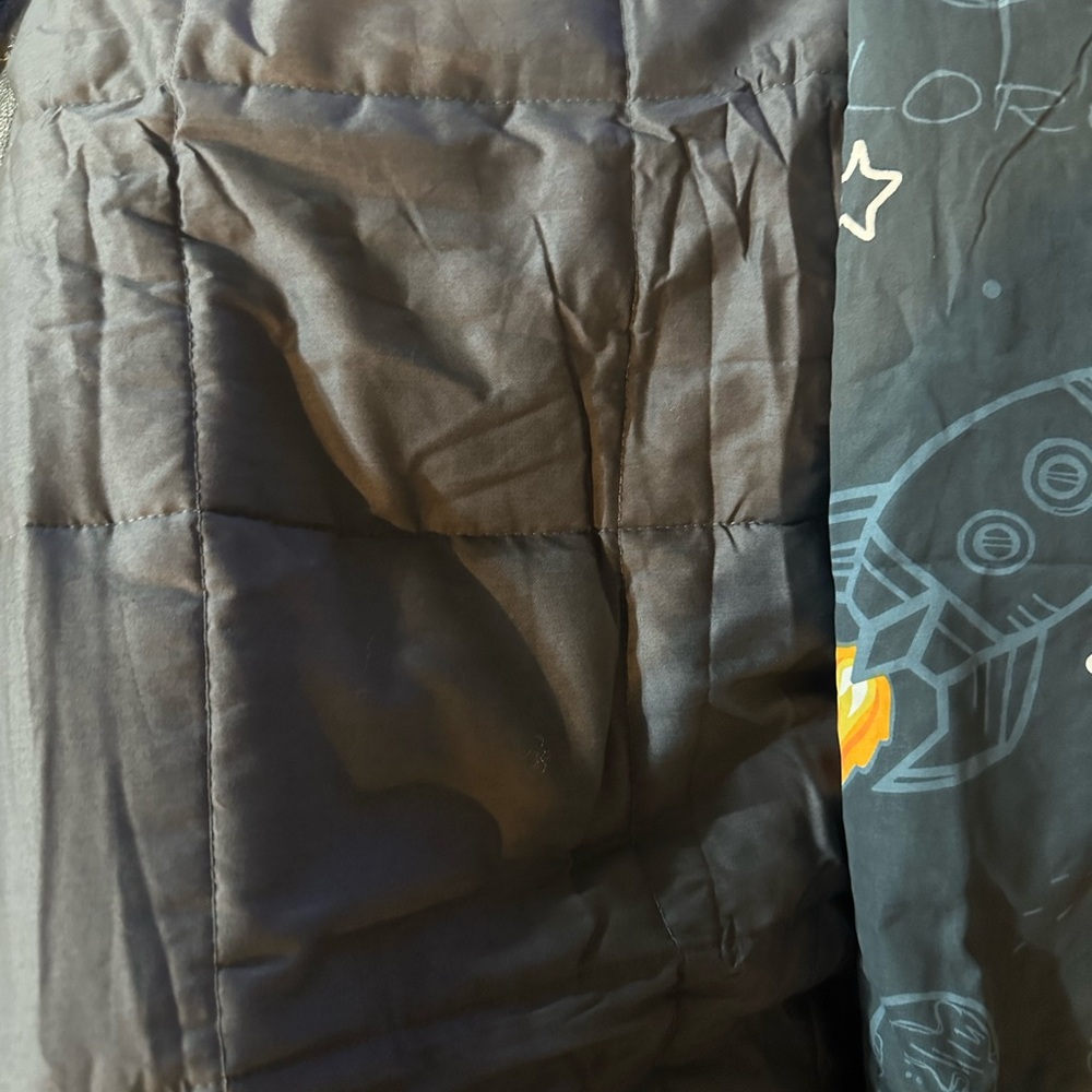 Weighted blanket with Rocket Design cover